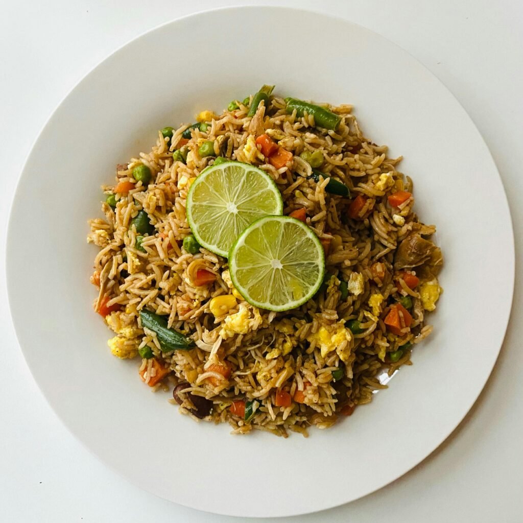 Colorful bowl of egg fried rice with vegetables
